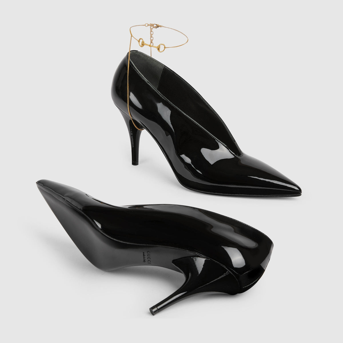 Gucci Women's Black Leather Décolletté Pumps with Jewel